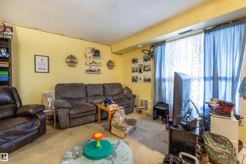 279 Surrey Gardens, Edmonton, AB - Indoor Photo Showing Living Room