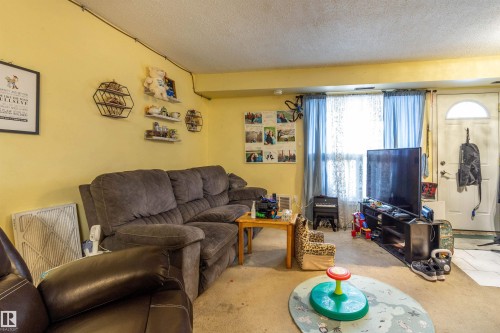279 Surrey Gardens, Edmonton, AB - Indoor Photo Showing Living Room