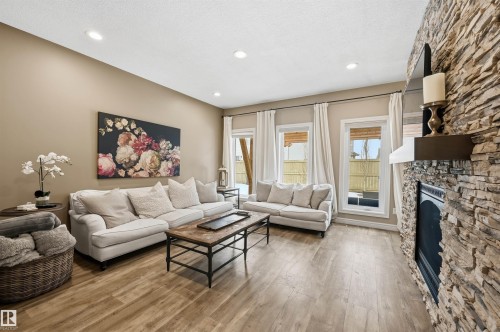 6477 Elston Loop, Edmonton, AB - Indoor Photo Showing Living Room With Fireplace