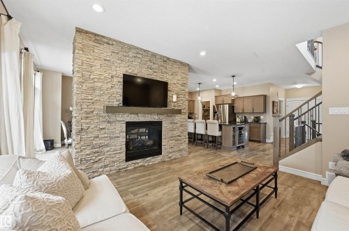 6477 Elston Loop, Edmonton, AB - Indoor Photo Showing Living Room With Fireplace