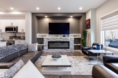 73 230 Edgemont Road, Edmonton, AB - Indoor Photo Showing Living Room With Fireplace