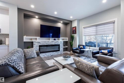 73 230 Edgemont Road, Edmonton, AB - Indoor Photo Showing Living Room With Fireplace