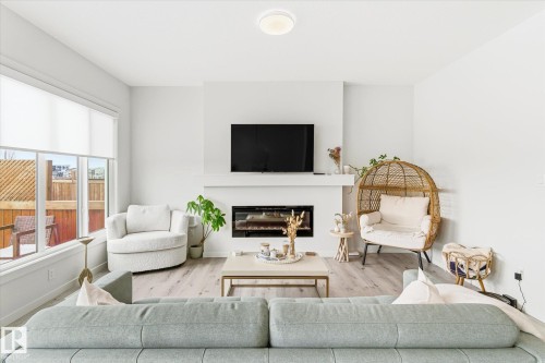 20031 26 Avenue, Edmonton, AB - Indoor Photo Showing Living Room With Fireplace
