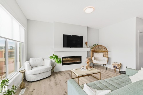 20031 26 Avenue, Edmonton, AB - Indoor Photo Showing Living Room With Fireplace