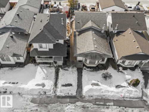 The property features a peaked roof and a front porch - 5837 162A Avenue, Edmonton, AB - Outdoor