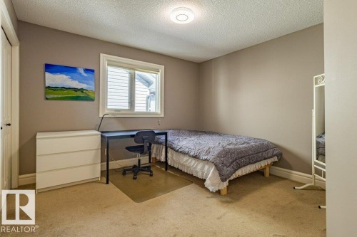 11408 15 Avenue Sw, Edmonton, AB - Indoor Photo Showing Bedroom