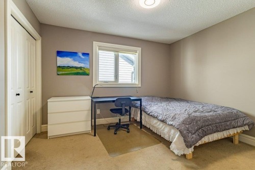 11408 15 Avenue Sw, Edmonton, AB - Indoor Photo Showing Bedroom