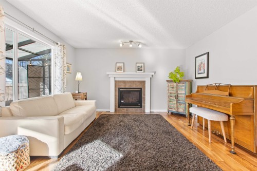 1849 Holman Crescent, Edmonton, AB - Indoor Photo Showing Living Room With Fireplace