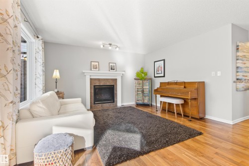 1849 Holman Crescent, Edmonton, AB - Indoor Photo Showing Living Room With Fireplace