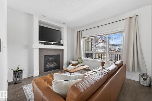 9708 220 Street, Edmonton, AB - Indoor Photo Showing Living Room With Fireplace