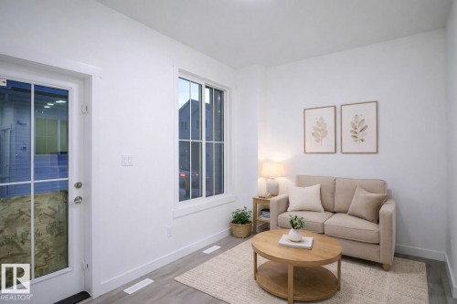 53 7110 Keswick Common Sw, Edmonton, AB - Indoor Photo Showing Living Room