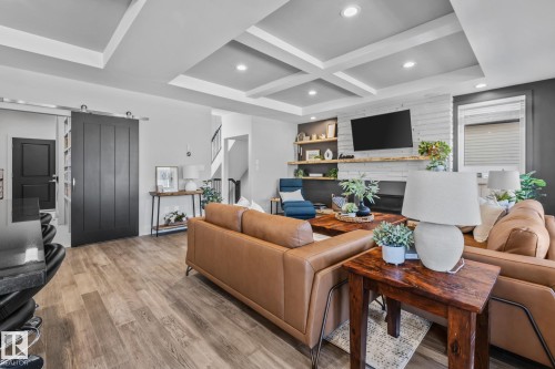 25 Enchanted Way, St. Albert, AB - Indoor Photo Showing Living Room With Fireplace