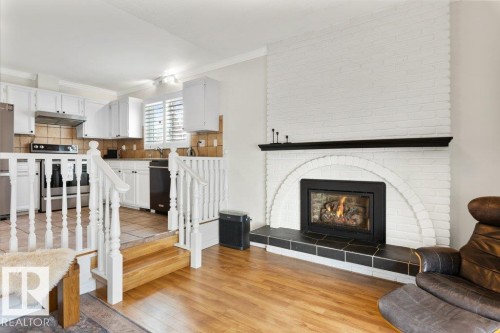 7 Murray Crescent, St. Albert, AB - Indoor Photo Showing Living Room With Fireplace