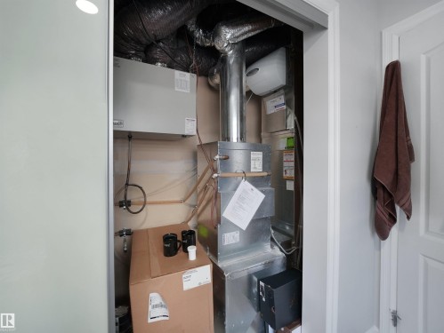 The property features a dedicated utility closet for the HVAC system, which includes a furnace, ductwork, and associated piping - 138 804 Welsh Drive, Edmonton, AB - Indoor
