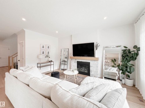 29 Cannes Cove, St. Albert, AB - Indoor Photo Showing Living Room With Fireplace