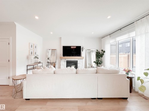 29 Cannes Cove, St. Albert, AB - Indoor Photo Showing Living Room With Fireplace