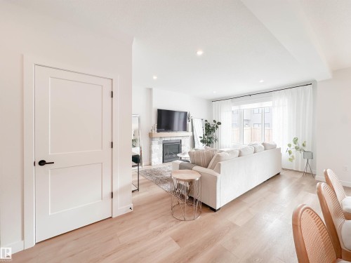 29 Cannes Cove, St. Albert, AB - Indoor Photo Showing Living Room With Fireplace