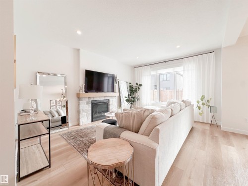 29 Cannes Cove, St. Albert, AB - Indoor Photo Showing Living Room With Fireplace