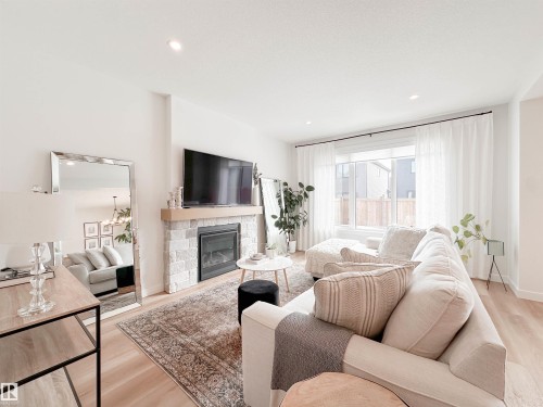 29 Cannes Cove, St. Albert, AB - Indoor Photo Showing Living Room With Fireplace