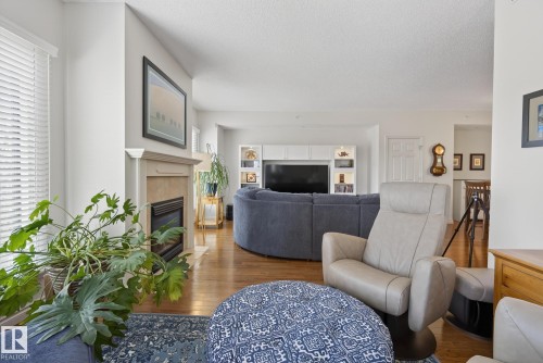 307 10108 125 Street, Edmonton, AB - Indoor Photo Showing Living Room With Fireplace