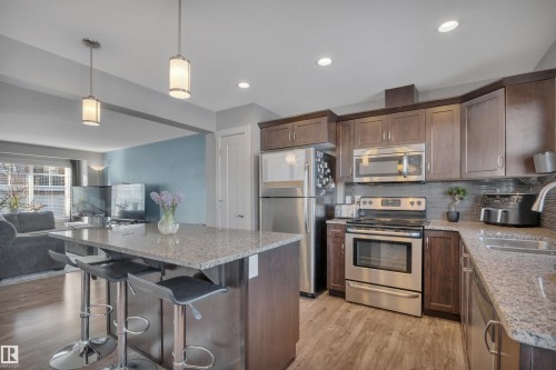 4 5203 149 Avenue, Edmonton, AB - Indoor Photo Showing Kitchen With Stainless Steel Kitchen With Double Sink