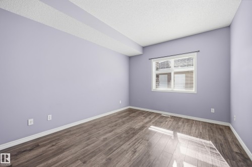 111 3040 Spence Wynd, Edmonton, AB - Indoor Photo Showing Other Room