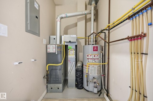 111 3040 Spence Wynd, Edmonton, AB - Indoor Photo Showing Basement