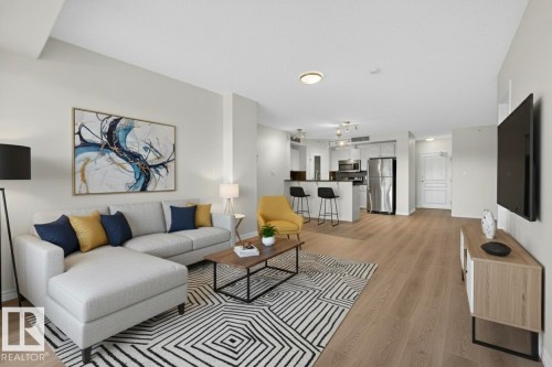 203 9707 106 Street, Edmonton, AB - Indoor Photo Showing Living Room