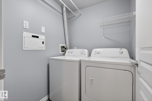 203 9707 106 Street, Edmonton, AB - Indoor Photo Showing Laundry Room