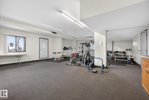 203 9707 106 Street, Edmonton, AB - Indoor Photo Showing Gym Room