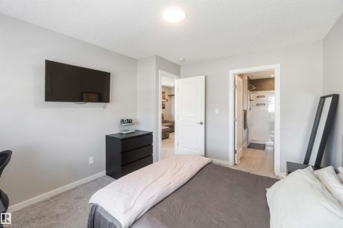 The bedroom features light grey walls and light grey carpet - 29 Gambel Loop, Spruce Grove, AB - Indoor Photo Showing Bedroom