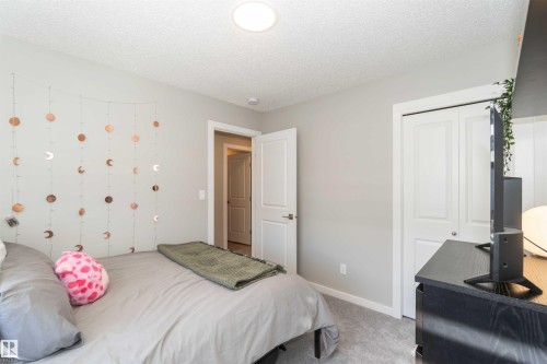 This room features light grey walls, a light grey carpet, and a white ceiling - 29 Gambel Loop, Spruce Grove, AB - Indoor Photo Showing Bedroom