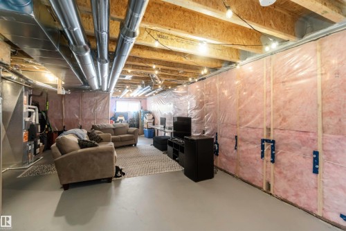 Expansive unfinished basement offering versatile space and a concrete floor - 29 Gambel Loop, Spruce Grove, AB - Indoor Photo Showing Basement