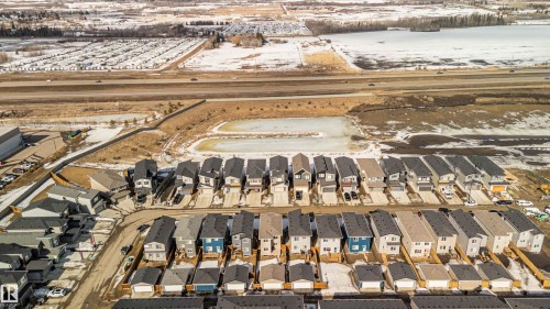 Aerial view of the community, showcasing a residential area with a collection of properties - 29 Gambel Loop, Spruce Grove, AB - Outdoor With View