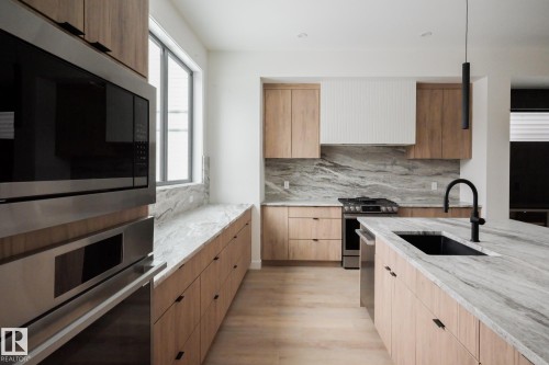 9140 74 Avenue, Edmonton, AB - Indoor Photo Showing Kitchen With Upgraded Kitchen