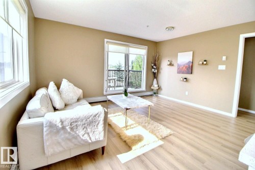 266 1196 Hyndman Road, Edmonton, AB - Indoor Photo Showing Living Room