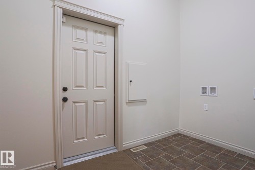 Laundry Room /Mud room/ with laundry chute - 21 Willow Way, Stony Plain, AB - Indoor Photo Showing Other Room