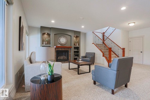 21 Willow Way, Stony Plain, AB - Indoor Photo Showing Other Room With Fireplace