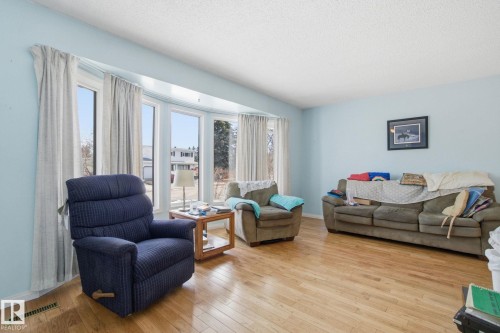 Living room with Bay Window - 82 Windermere Drive, Spruce Grove, AB - Indoor Photo Showing Living Room