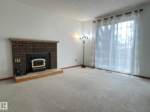 9928 181 Street, Edmonton, AB - Indoor Photo Showing Living Room With Fireplace