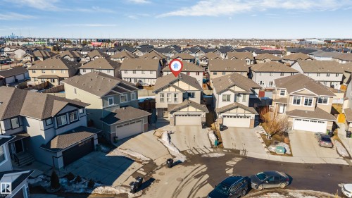 Aerial view of the property, featuring a two-story design with an attached garage - 2244 21 Avenue, Edmonton, AB - Outdoor With View
