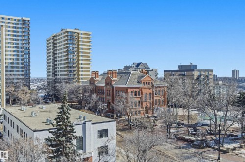 The property is situated in a vibrant urban setting, surrounded by diverse architectural styles - 601 10504 99 Avenue, Edmonton, AB - Outdoor With Facade