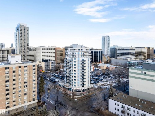 This property offers expansive views of the city skyline, featuring a variety of architectural styles - 601 10504 99 Avenue, Edmonton, AB - Outdoor With Facade