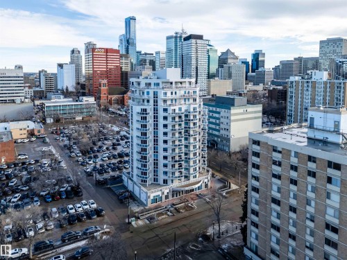 The property is a high-rise building with a white facade and curved balconies - 601 10504 99 Avenue, Edmonton, AB - Outdoor With View