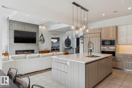 3631 Westcliff Way, Edmonton, AB - Indoor Photo Showing Kitchen With Fireplace With Double Sink With Upgraded Kitchen