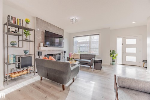 8086 Kiriak Link, Edmonton, AB - Indoor Photo Showing Living Room With Fireplace