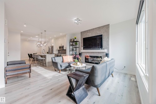 8086 Kiriak Link, Edmonton, AB - Indoor Photo Showing Living Room With Fireplace