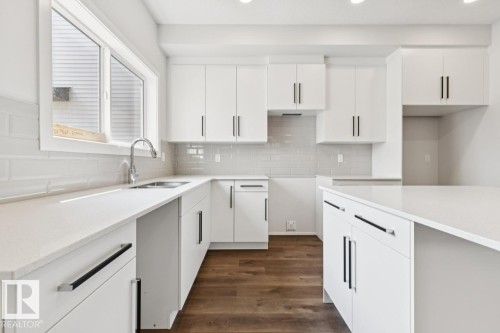59 Gambel Loop, Spruce Grove, AB - Indoor Photo Showing Kitchen With Double Sink
