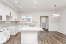 59 Gambel Loop, Spruce Grove, AB  - Indoor Photo Showing Kitchen With Upgraded Kitchen 