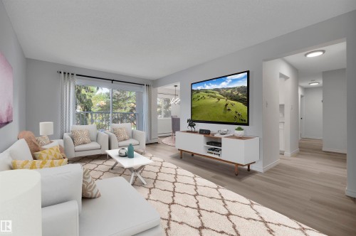 222 5730 Riverbend Road, Edmonton, AB - Indoor Photo Showing Living Room